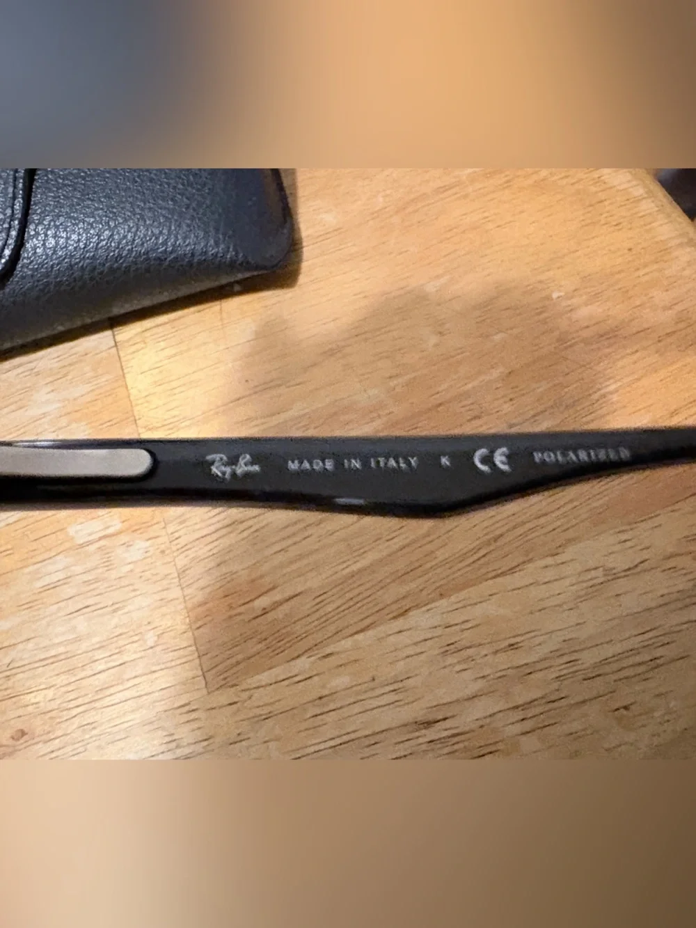 Ray-Ban Black Frame Sunglasses with Green Lenses